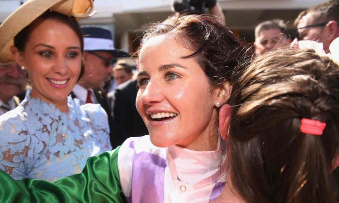 Michelle Payne with sisters post race